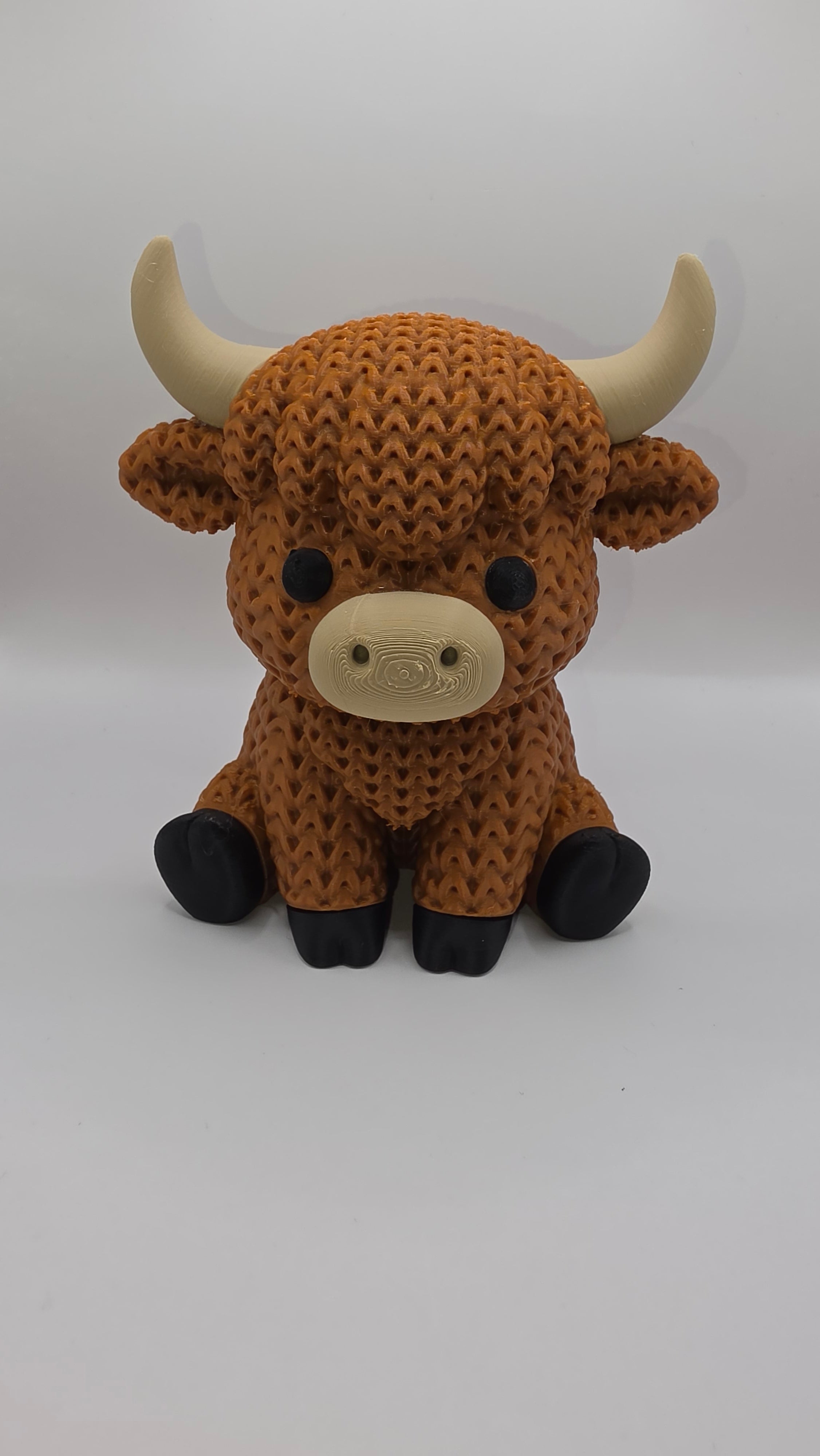 Sitting Knitted Highland Cow